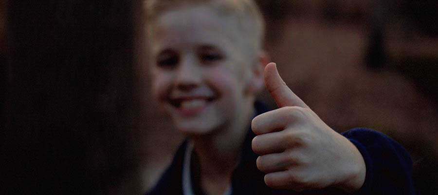 A person giving a thumbs up sign.