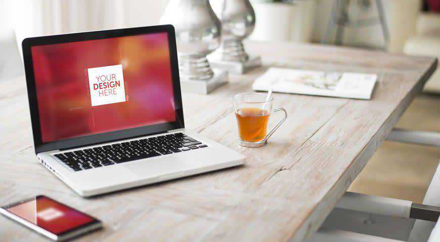 Laptop and Smartphone on Wooden Table Photoshop PSD Mockup Template