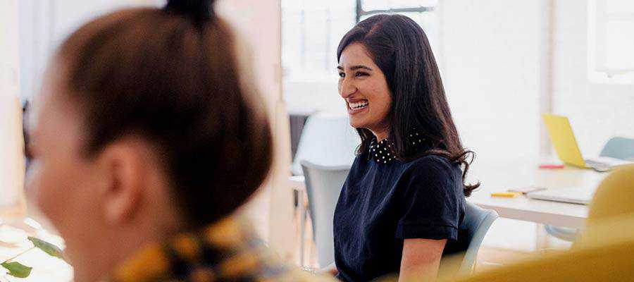A woman smiling.