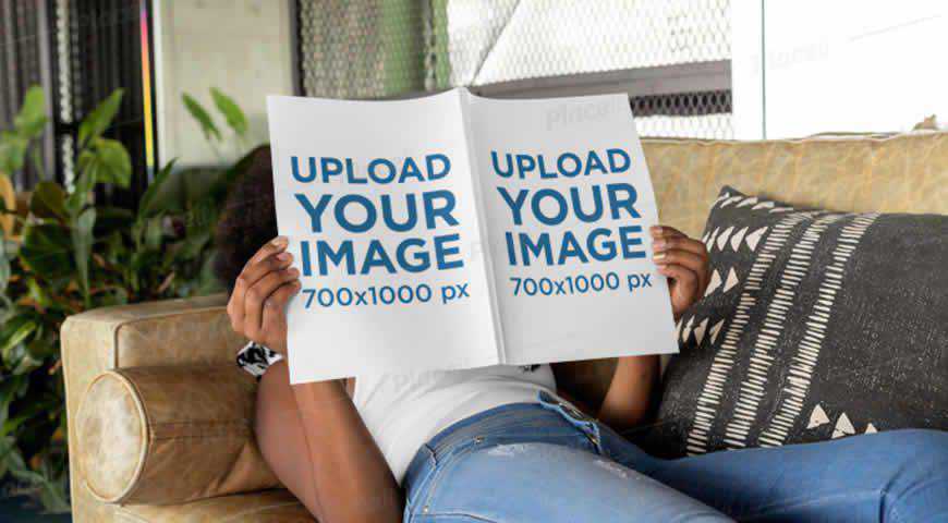 Magazine Mockup Featuring a Woman Lying on a Couch Photoshop PSD Mockup Template