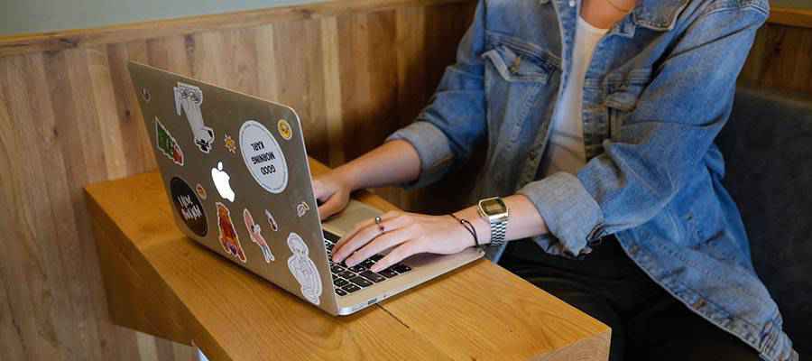 A woman using a laptop computer.